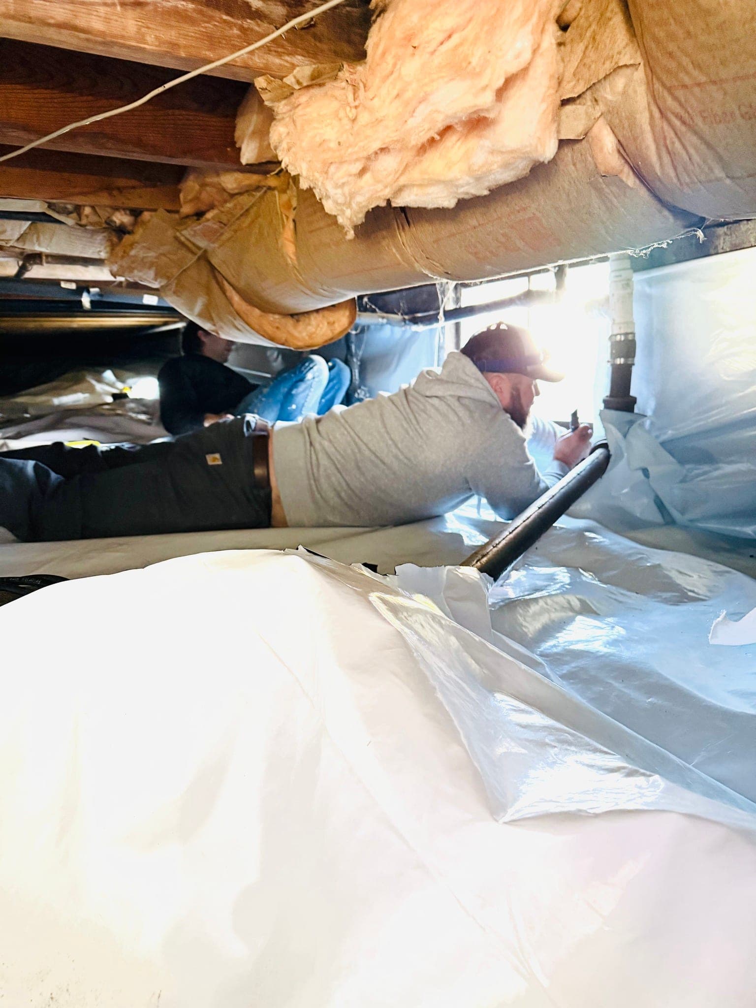 Insulated and encapsulated residential crawlspace with vapor barrier in Missouri